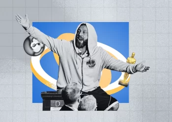 Adam Sandler wearing a hoodie and basketball shorts at the 2025 Oscars, breaking red carpet norms.