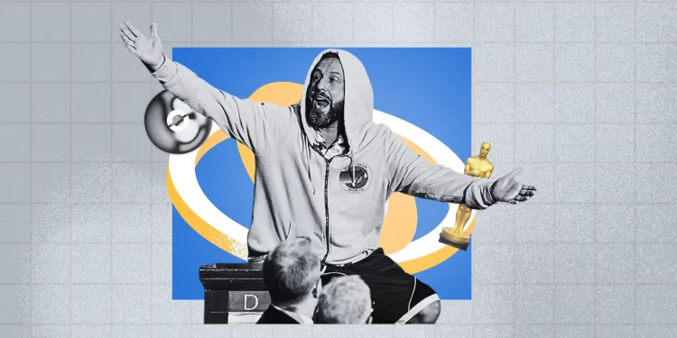 Adam Sandler wearing a hoodie and basketball shorts at the 2025 Oscars, breaking red carpet norms.