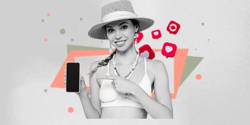 Instagram creator sipping iced coffee in sunlight, with a cozy summer setup in the background.