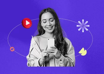 Creator in summer outfit recording YouTube Shorts near a beach with Squid Game-inspired elements in the background.