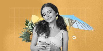 A travel influencer filming content at sunset near a remote beach location