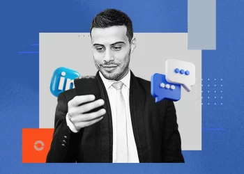 A professional recording a short video on LinkedIn while seated in a casual workspace