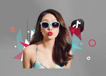 Friends running on a beach at sunset, capturing a TikTok trend moment.