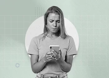 A person looking at multiple notifications on their phone, surrounded by blurred messages and icons.