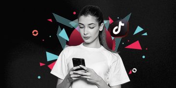 Screenshot of trending TikTok videos in December 2025 featuring holiday content, family creators, and AI clips