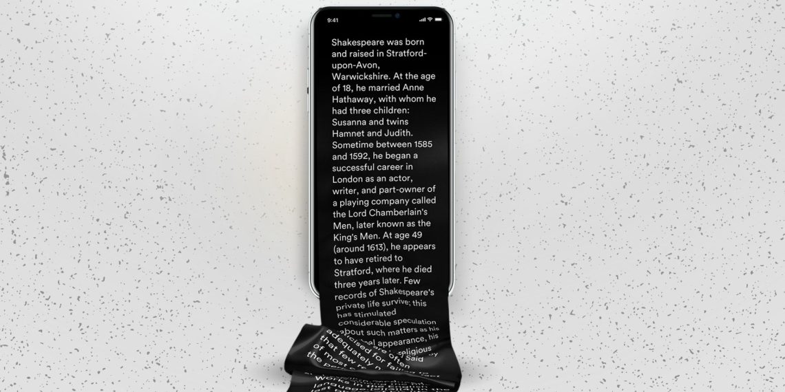 A content creator writing long-form content surrounded by AI-generated short clips.
