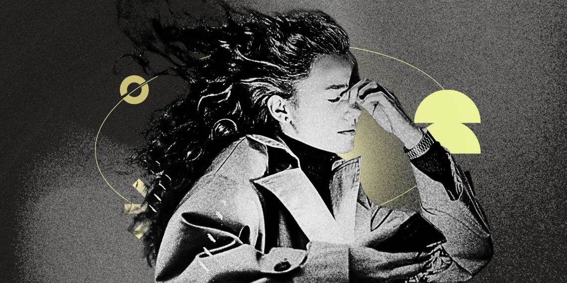 A melancholic influencer sitting alone in an urban setting reflecting doomer aesthetic